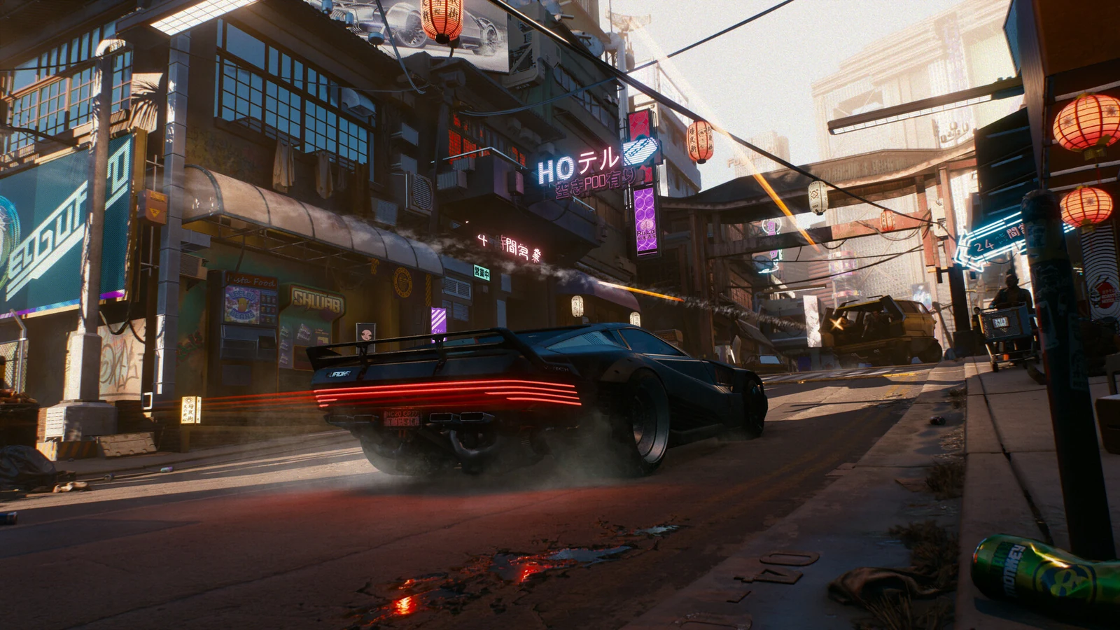 V e un’auto davanti allo skyline di Night City