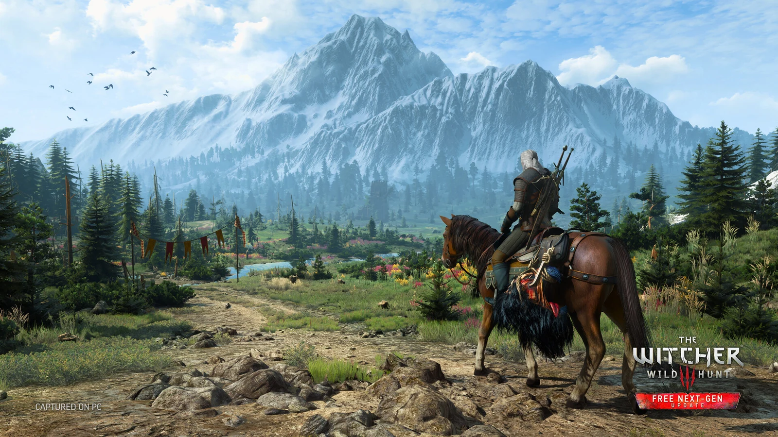 Geralt a cavallo davanti alle montagne nella copertina della guida di The Witcher 3